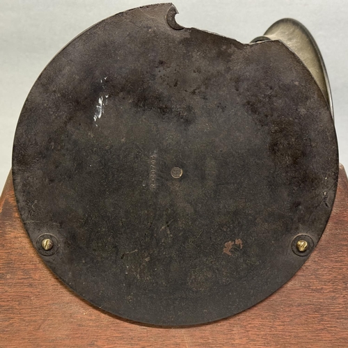 137 - A mid-century Seth Thomas Deck Clock with white numbers on a black face in a Bakelite case with knur... 