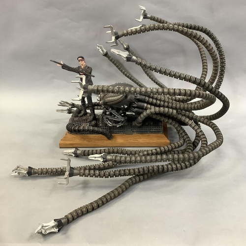 164 - A McFarlane Toys ‘The Matrix’ diorama featuring a 16cm Neo character with interchangeable heads and ... 