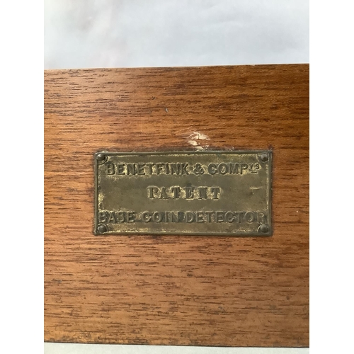 172 - A Benetfink & Company’s Base Coin Detector with patented brass counterweight system and printed inst... 