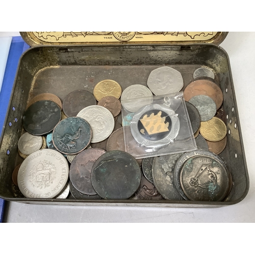 297 - Tin of miscellaneous English and foreign coins including George II half guinea coin weight, Wesleyan... 