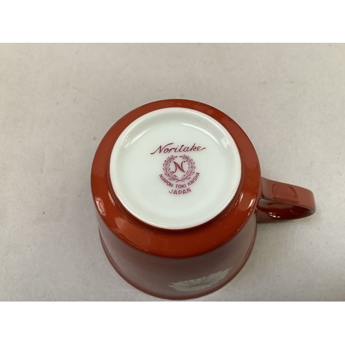 309 - A modern Noritake coffee service comprising coffee pot, lidded sugar, cream jug, six coffee cups and... 
