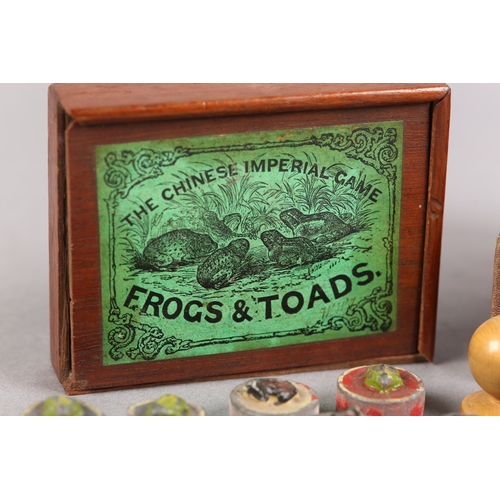 43 - A VICTORIAN PARLOUR GAME 'THE CHINESE IMPERIAL GAME FROGS AND TOADS', including twelve ceramic piece... 