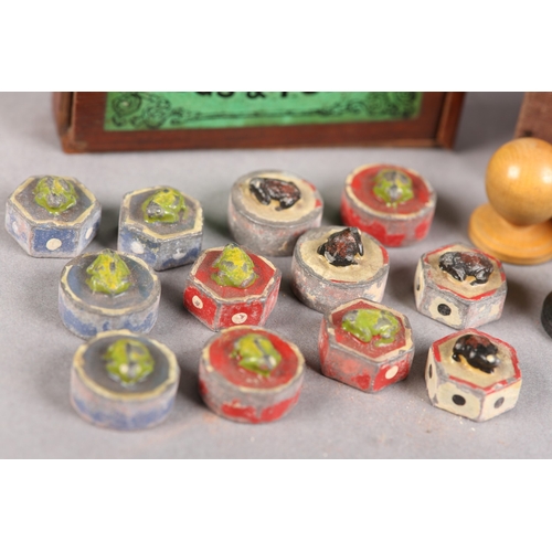 43 - A VICTORIAN PARLOUR GAME 'THE CHINESE IMPERIAL GAME FROGS AND TOADS', including twelve ceramic piece... 