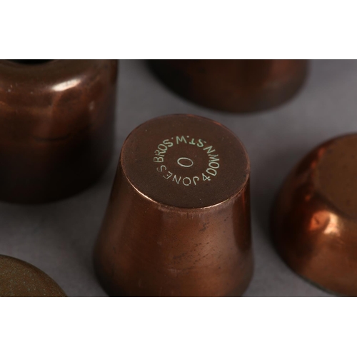32 - A SET OF FIVE MINIATURE COPPER RING MOULDS, 4.5cm diameter x 3.75cm high, five tapered moulds, 3.5cm... 