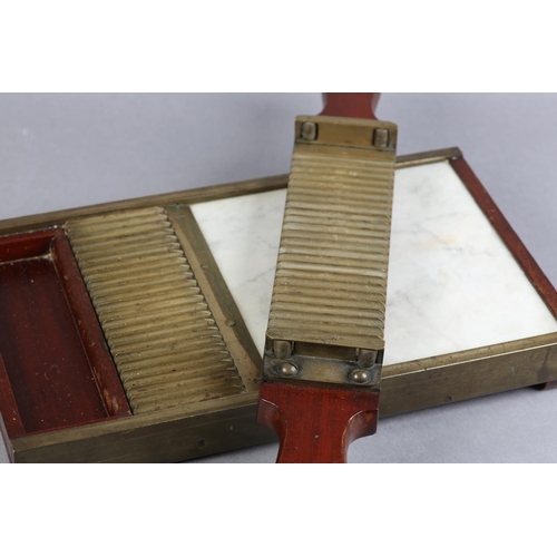 17 - A 19TH CENTURY MAHOGANY AND BRASS PILL MAKER inset with marble slab, 20.5cm wide x 35.5cm long