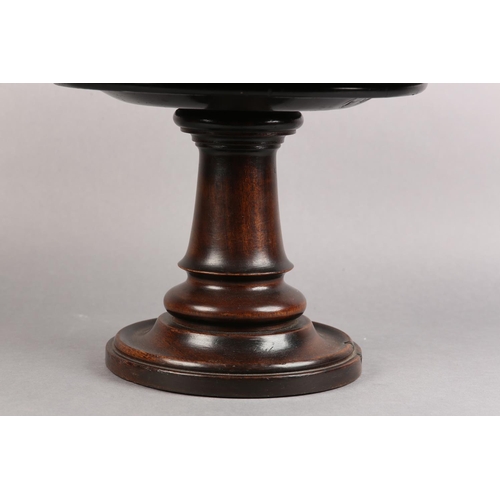 19 - A 19TH CENTURY MAHOGANY STAND, the circular top with screw thread on a turned column and dished base... 