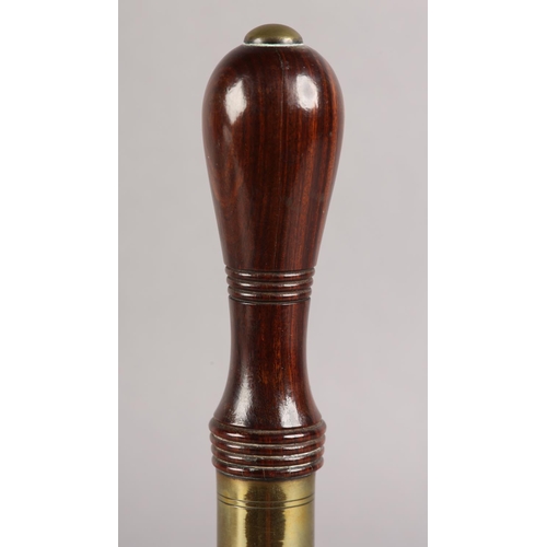 30 - AN EARLY 20TH CENTURY HANDBELL, with turned lignum vitae handle, 25cm high
