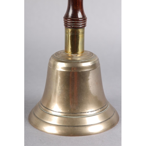 30 - AN EARLY 20TH CENTURY HANDBELL, with turned lignum vitae handle, 25cm high