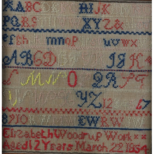 12 - A MID 19TH CENTURY SAMPLER by Elizabeth Woodrup Aged 12 Years March 22 1854, with alphabet and numbe... 