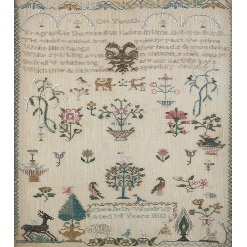 11 - AN EARLY 19TH CENTURY SAMPLER by Elizabeth Woodrup Aged 14 years 1813, worked in coloured silks, wit... 