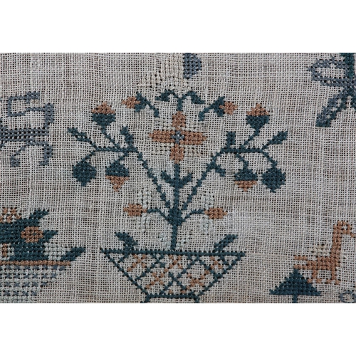 10 - AN EARLY 19TH CENTURY SAMPLER by Elizabeth Woodrup Aged 10 1809, worked in coloured silks, with 'By ... 