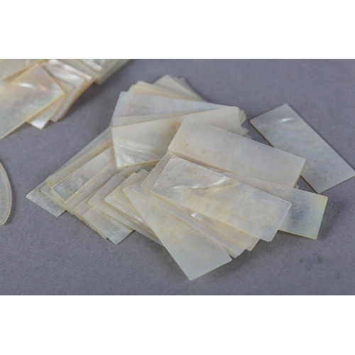 45 - A QUANTITY OF 18TH CENTURY CHINESE MOTHER OF PEARL GAMING COUNTERS, of rectangular (2 sizes) and cir... 