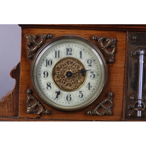 56 - A LATE 19TH CENTURY FRENCH OAK AND BRASS MOUNTED CLOCK BAROMETER-THERMOMETER, of architectural desig... 