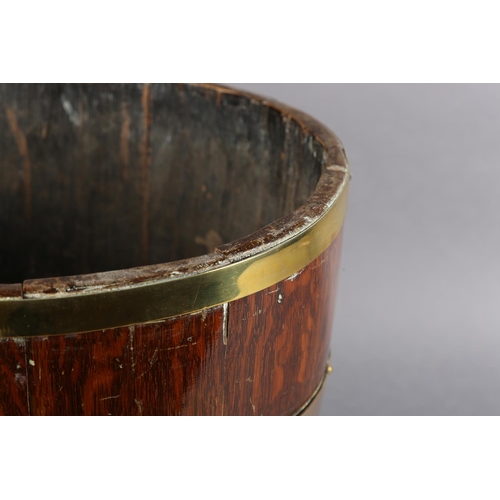 49 - A 19TH CENTURY OAK, BRASS AND COPPER BOUND BARREL, of oval outline, 40cm x 34cm x 32cm high (no base... 