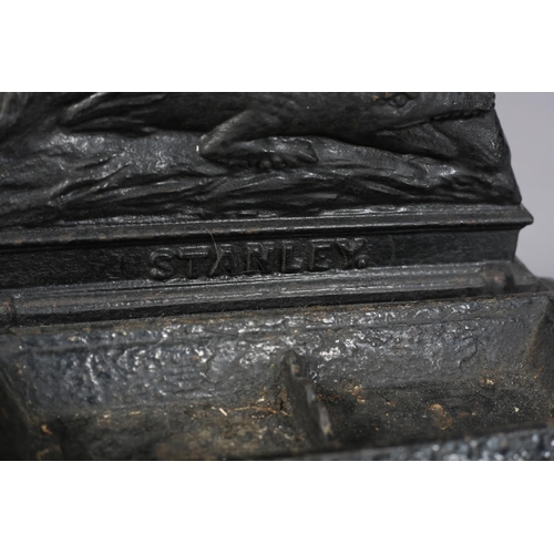 26 - A VICTORIAN CAST IRON STICK STAND, cast as the figure of Stanley, the explorer, modelled standing wi... 