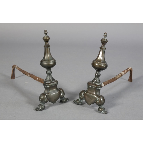 28 - A PAIR OF 19TH CENTURY BRONZE ANDIRONS, of baluster form with knop finial and on scrolled feet, 33cm... 