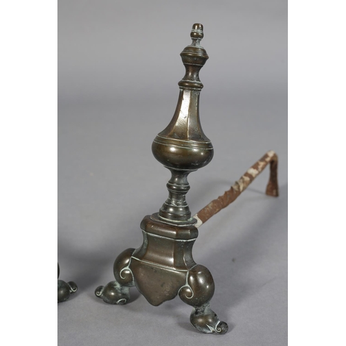 28 - A PAIR OF 19TH CENTURY BRONZE ANDIRONS, of baluster form with knop finial and on scrolled feet, 33cm... 