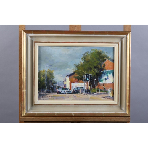32 - ARR Gordon Radford (1936-2015), Traffic Lights, street scene with figure, oil on board, signed to lo... 