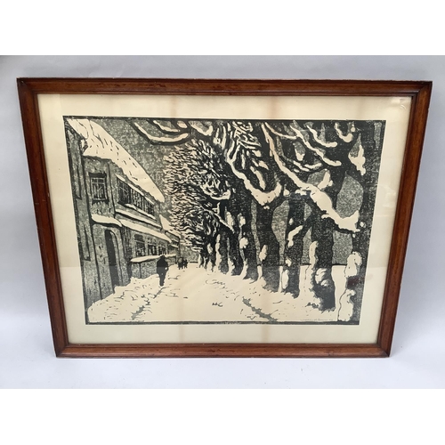 3 - Walther Klemm (1883-1957) figures in a snow covered street with trees, black and white wood-cut, sig... 