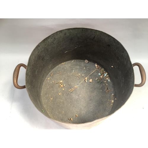 37 - Of London Midland Scotland Railway interest: a very large copper two-handled stock pan, stamped LMS ... 