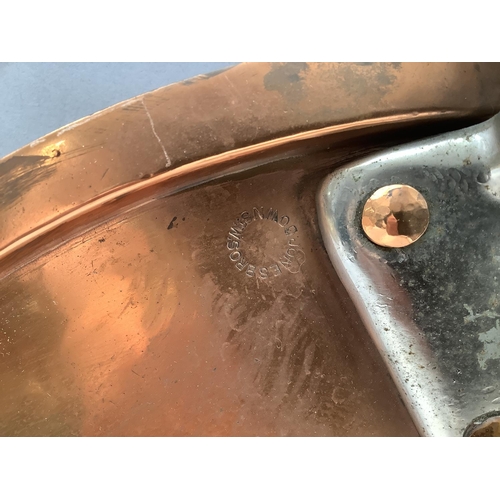 38 - Three large copper pan lids with steel handles with hanging loop by Jones Brothers Down Street W and... 