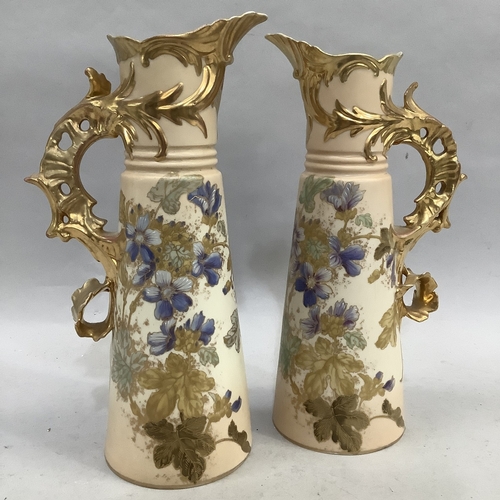 5 - A pair of Austrian porcelain ewers  printed and enamelled with cornflower spray in blue and gilt wit... 