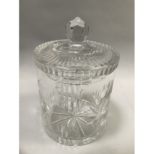 21 - A large cut glass biscuit barrel, 24cm high x 16cm