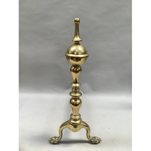 28 - A pair of brass and irons, on paw feet