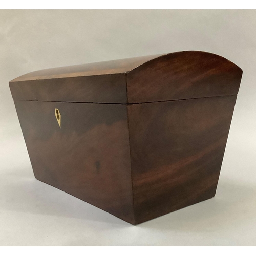 33 - A 19th century mahogany domed top caddy crossbanded in rosewood and having a bone escutcheon the int... 