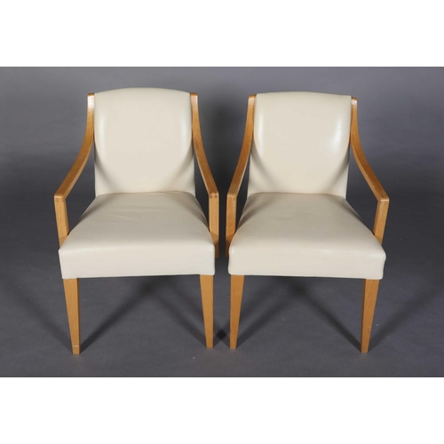 14 - A pair of pale oak and cream leather side chairs, on square tapered legs