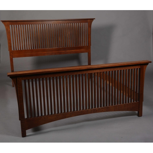 44 - Stickley Inc NY USA, an Arts & Crafts oak rail end bedstead of Mission style, queen size, 179cm wide... 