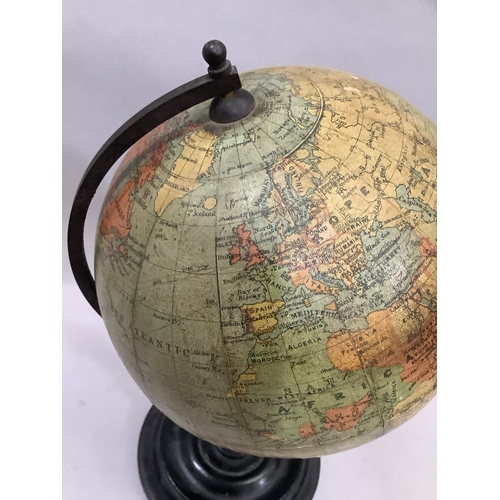 33 - A 1930s Philips' 6in Terrestrial Globe, made for the London Geographical Institution, on an ebonised... 