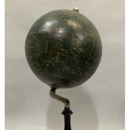 34 - A 1930s Philips' Popular Celestial Globe Magnitudes 1st, 2nd, 3rd, 4th and 5th, on an ebonised turne... 