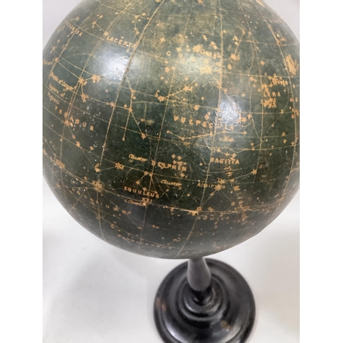 34 - A 1930s Philips' Popular Celestial Globe Magnitudes 1st, 2nd, 3rd, 4th and 5th, on an ebonised turne... 