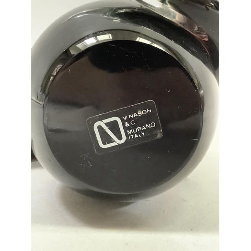 29 - V & C Nason for Murano, Italy, a dolphin and ball, red and black cased in clear glass, label to unde... 