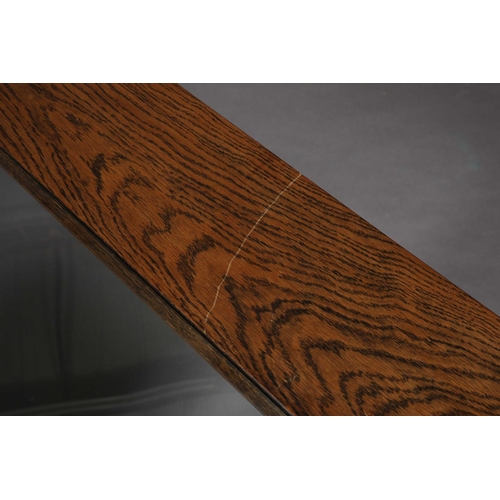 47 - A brutalist oak and glass inset coffee table, on square legs, 100cm square x 45cm high