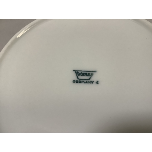 52 - An extensive Thomas Germany china dinner, tea and coffee service in white with silver banding to the... 