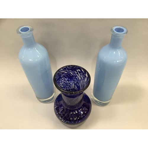 12 - A cobalt blue and clear marbled glass vase with smoothed pontil 20cm high together with a pair of pa... 