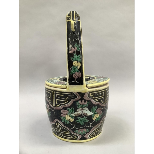 18 - A Japanese early 20th century food basket and cover with handle enamelled in yellow, black and green... 