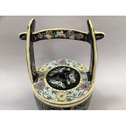 18 - A Japanese early 20th century food basket and cover with handle enamelled in yellow, black and green... 