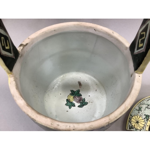 18 - A Japanese early 20th century food basket and cover with handle enamelled in yellow, black and green... 