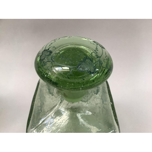 22 - A pair of green soda glass decanters of square outline with mushroom stoppers painted with fruiting ... 