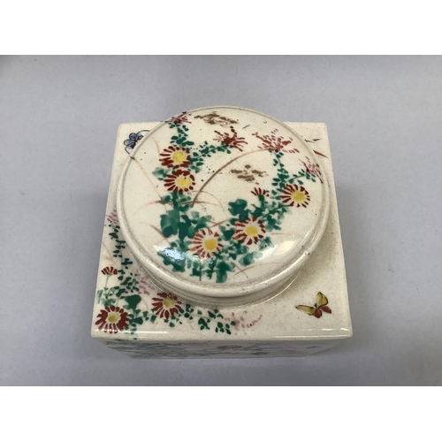 27 - A late 19th century Japanese pottery jar of square outline the circular cover and each panel painted... 