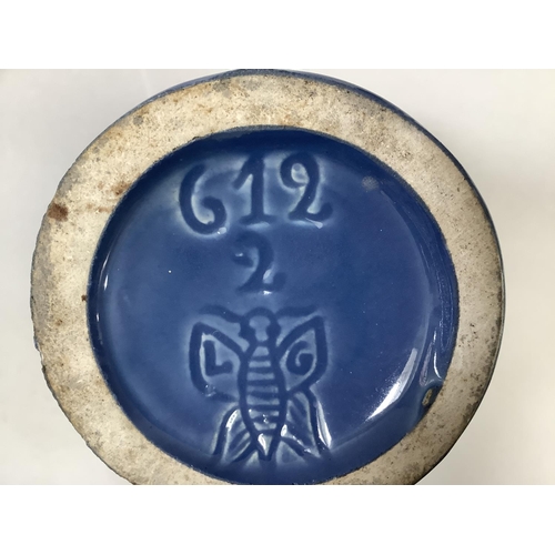 28 - A pair of mid blue vases painted in silver lustre and white enamel with flowering leaf scrolls, the ... 