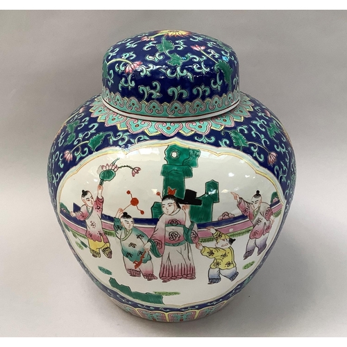 31 - A 20th century Chinese ginger jar and cover painted with reserves of mother with sons in a garden la... 