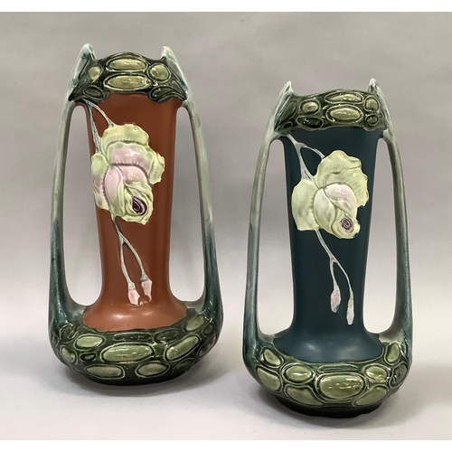 41 - A pair of Eichwald two handled vases in grey and dark blue 19.5cm wide, together with two long handl... 