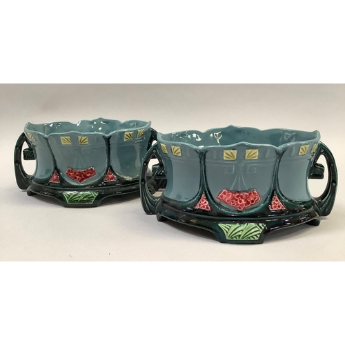 41 - A pair of Eichwald two handled vases in grey and dark blue 19.5cm wide, together with two long handl... 