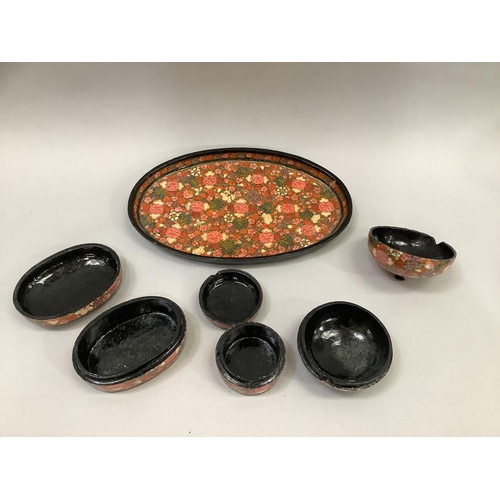 34 - A papier-mache oval tray and three trinket boxes, together with a barbola style mirror, 22.5cm