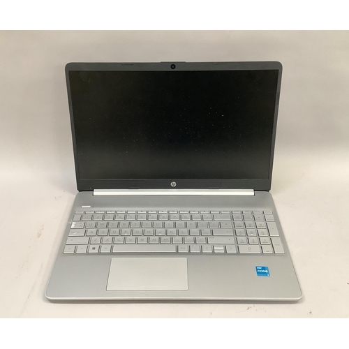 38 - An HP laptop and charger, wiped