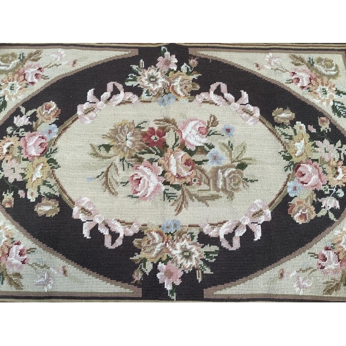 37B - An Aubusson style tapestry panel in cream, rose and dark brown, 59.5cm x 89.5cm
